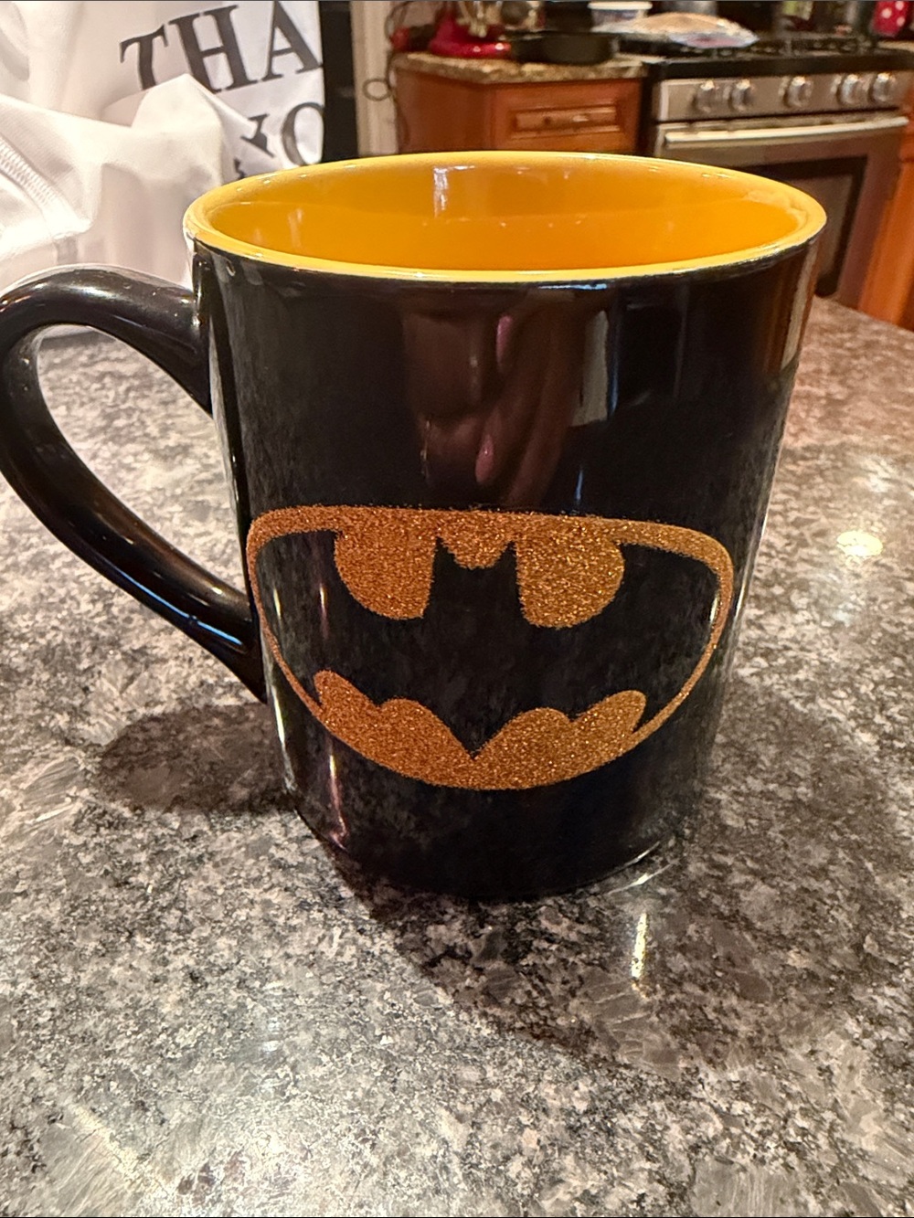 DC Comics Black Mug with Gold Batman Logo and Yellow Interior
